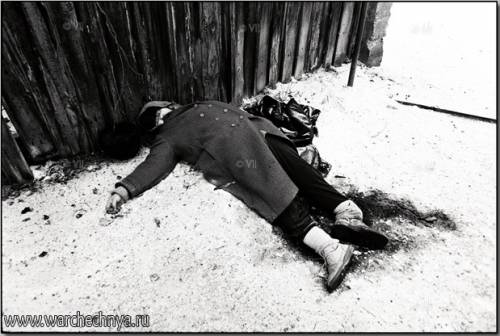 A Russian woman killed by Russian shelling in Grozny, Jan...