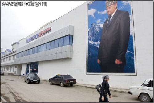 A wall poster of former Chechen President Akhmad Kadyrov ...